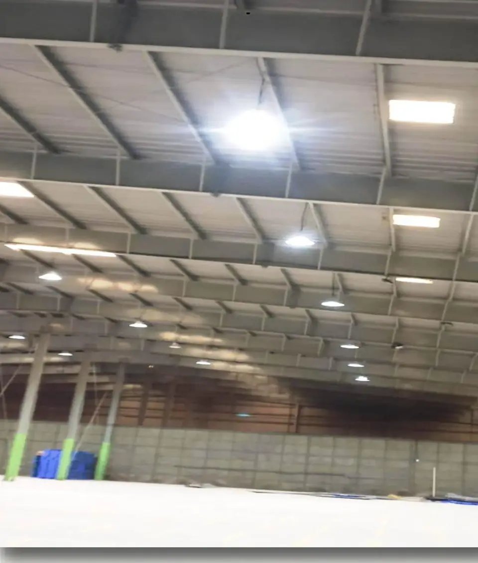 High bay light fixtures in warehouse - MEP project by Chamunda Electromech